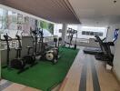 Residential building gym with various exercise equipment