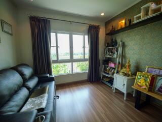 Cozy living room with large windows and natural light