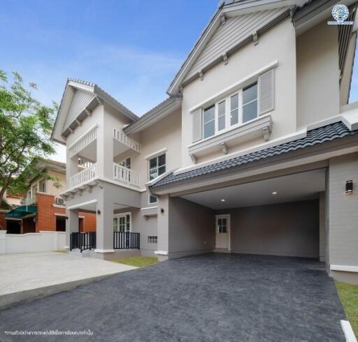 Spacious two-story house with a large driveway and garage