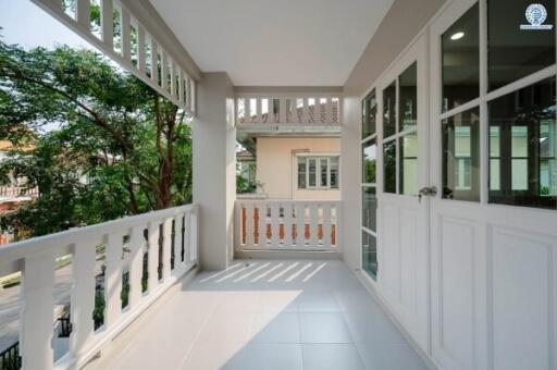 Spacious balcony with a view of residential neighborhood