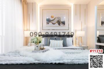 Modern bedroom interior with elegant decor and artwork