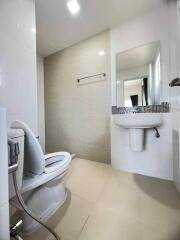 Modern bathroom with white fixtures