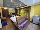 Cozy bedroom with artistic wall painting and modern amenities