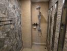 Spacious modern bathroom with walk-in shower and textured tile walls