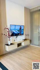 Modern living room with television and decorative panels