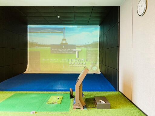 Indoor golf simulator setup in a modern entertainment room