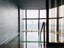 Luxurious high-rise building indoor pool with a city view