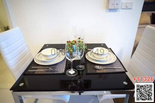 Well-set dining table with modern decor in a cozy dining area