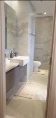 Modern bathroom interior with elegant fixtures and neutral tones