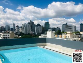 Rooftop pool with city skyline view