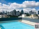 Rooftop pool with city skyline view