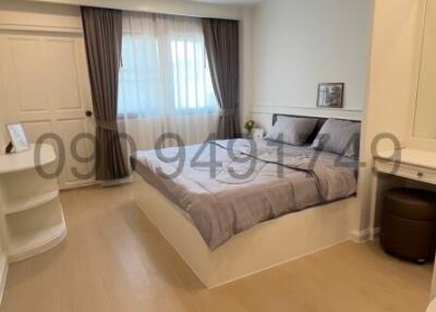 Spacious bedroom with ample natural light