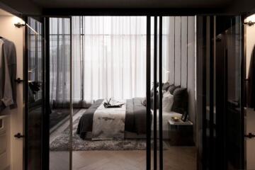 Modern bedroom interior with glass doors and elegant decor