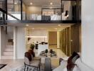 Modern open-concept building interior with a view of the kitchen, living area, and mezzanine