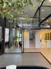 Modern two-story building interior with open floor plan and elegant design