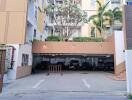 Secure parking garage entrance of a residential building with natural lighting