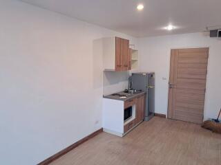 Modern kitchen with wooden cabinets and built-in appliances