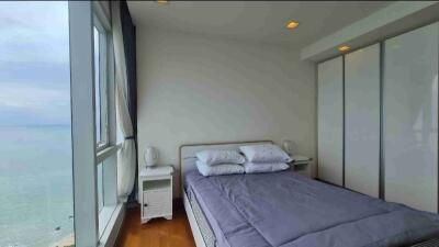 Modern bedroom with ocean view and ample natural light