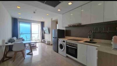 Modern kitchen with open layout and ocean view