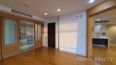 Spacious living room with hardwood floors and modern design