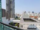 City view from the balcony of a high-rise apartment