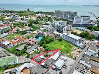 Aerial view of urban landscape showing property location and surrounding structures