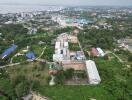 Aerial view of a residential area with buildings and greenery