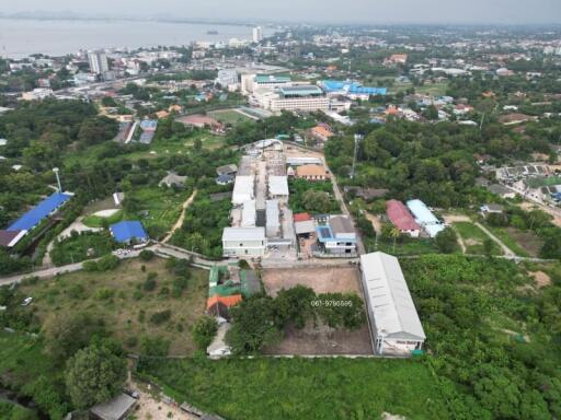 Aerial view of a residential area with buildings and greenery