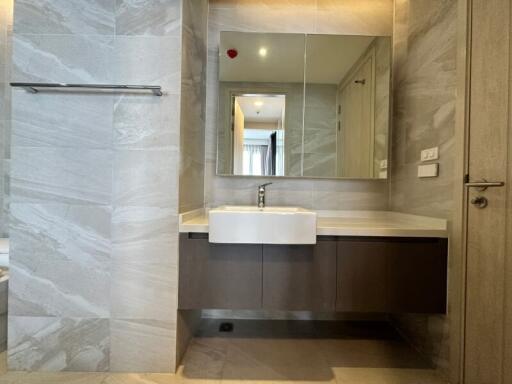 Modern bathroom with marble tile finish