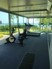 Gym with exercise equipment and sea view