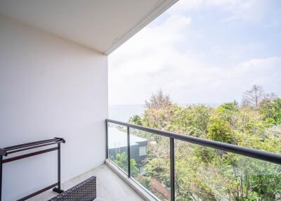 Spacious balcony with a scenic view and glass barrier