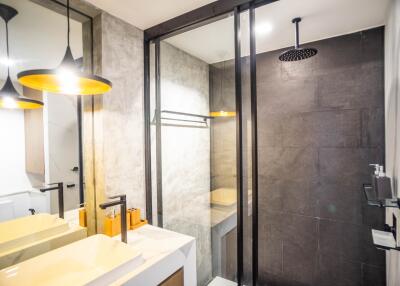 Modern bathroom with a walk-in shower and stylish fixtures