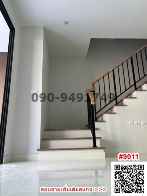 Modern staircase in a well-lit home interior