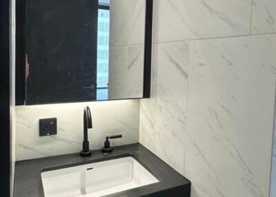Modern bathroom with marble walls and sleek designs