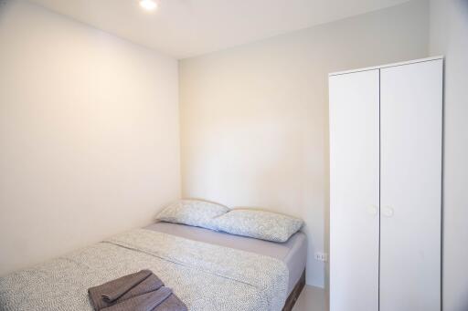 Modern bedroom with clean design and natural lighting