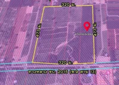 Overhead satellite image of a property boundary with measurements