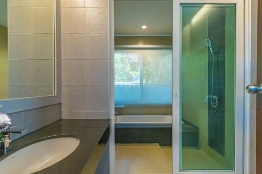 Modern bathroom with a walk-in shower and bathtub