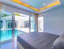 Modern bedroom with direct access to the swimming pool
