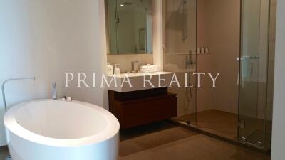 Modern bathroom with freestanding tub and glass shower