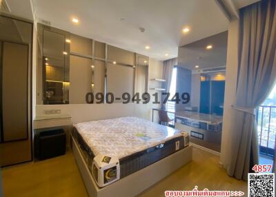 Spacious bedroom with modern design and attached bathroom