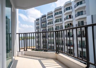 Spacious balcony with a view of neighboring apartment buildings