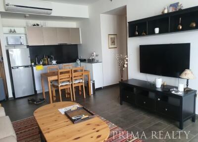 Spacious living room with dining area and modern open kitchen