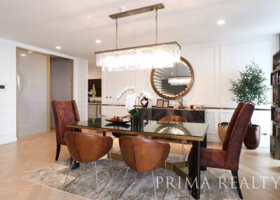 Modern dining room with elegant table set and chandelier