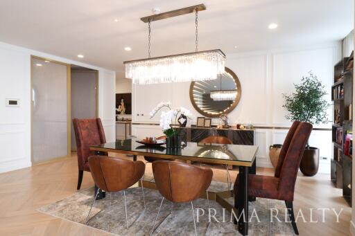 Modern dining room with elegant table set and chandelier