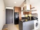 Modern apartment kitchen with stainless steel appliances