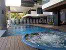 Modern residential building with outdoor pool and jacuzzi