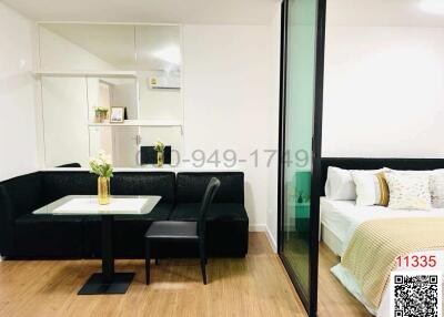 Compact studio apartment interior with integrated living and sleeping area