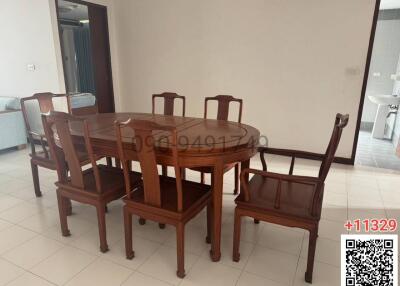 Spacious dining room with large table and chairs
