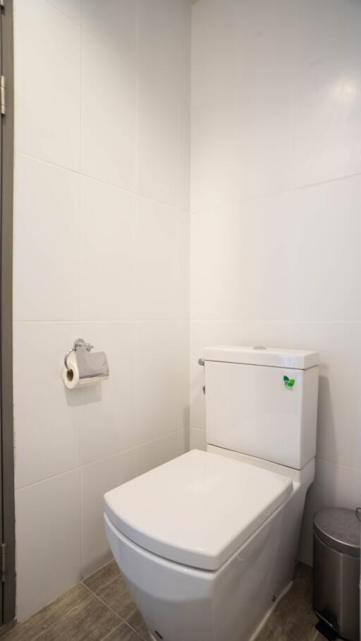 Modern white bathroom interior with a toilet
