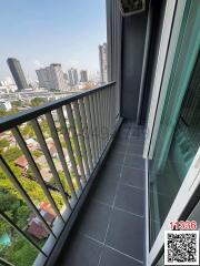 High-rise apartment balcony with city view